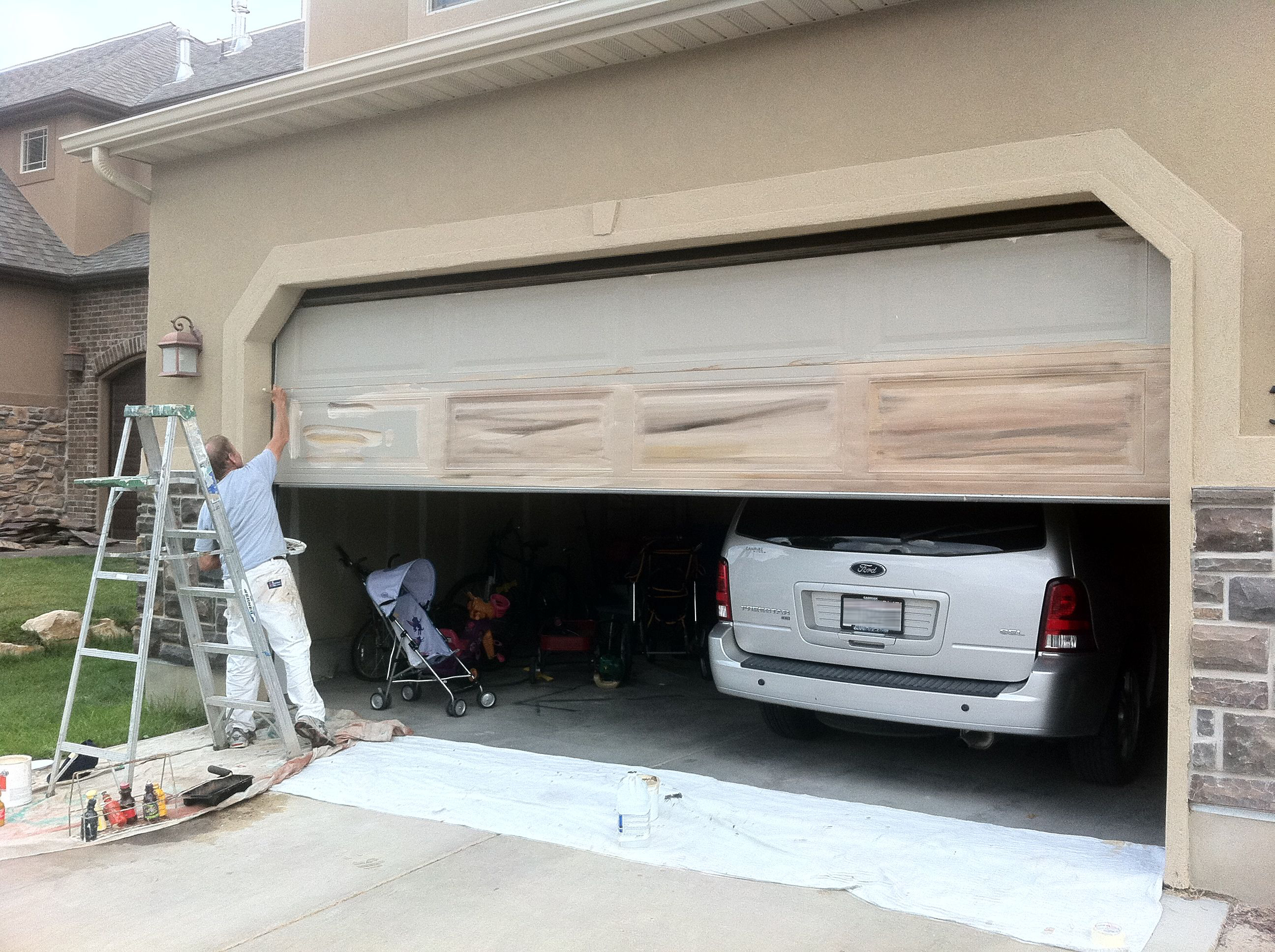 Matched To Exterior Saratoga Garage Entry Door In This Picture An Undercoat Using Light Colors To Match The Home S Exterior Is Being