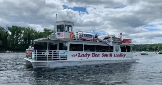 An image of the Lady Bea boat on the river. 