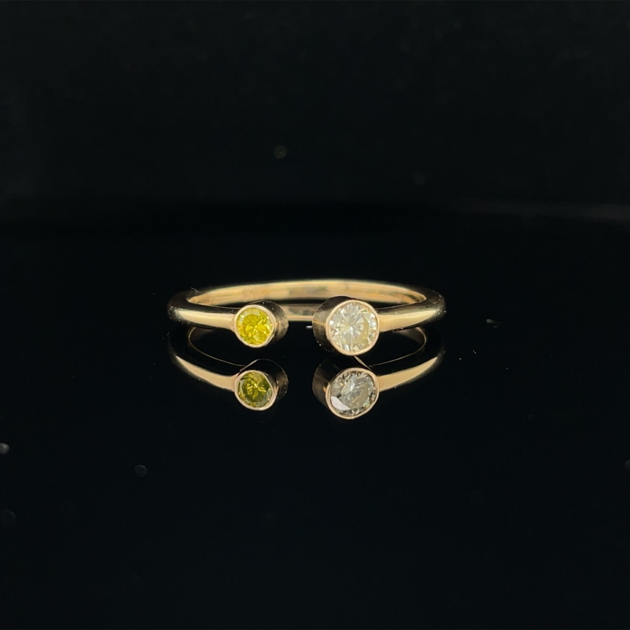 14KY open ring with bezel set yel dia and bezel set white diamond.  .25ct.tw.