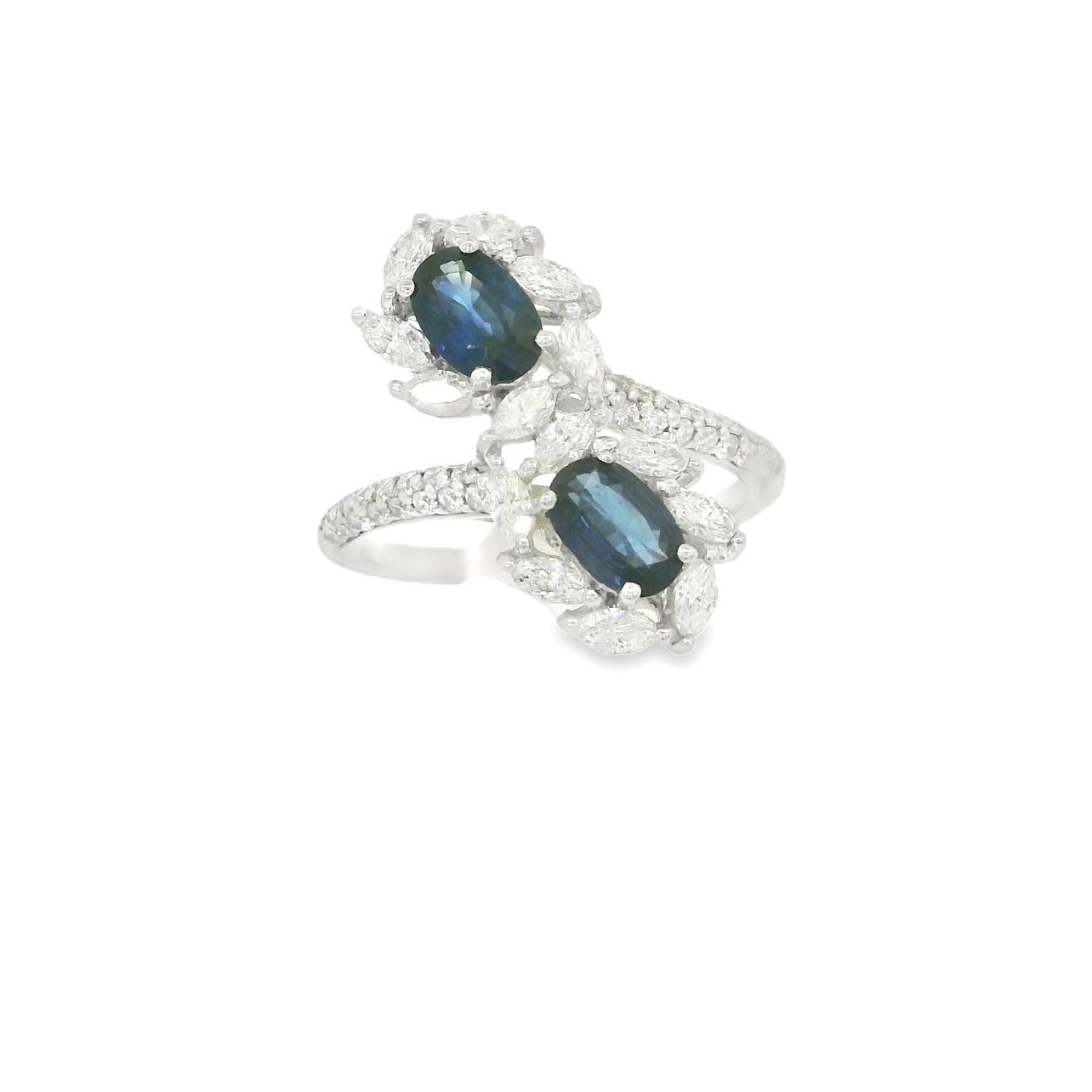 14kt White Gold, Two Oval Sapphires - 1.32 Carats, 14 Marquise Diamonds in Halo Settings - .56 Carats and 32 Round Diamonds Accenting Shank - .24 Carats. Gemstone Fashion Ring. 2.12 Carats Total Gem Weight