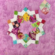 starburst dresden plate pattern purple green blue yellow
