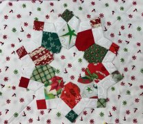 starburst dresden plate pattern in red, white, green