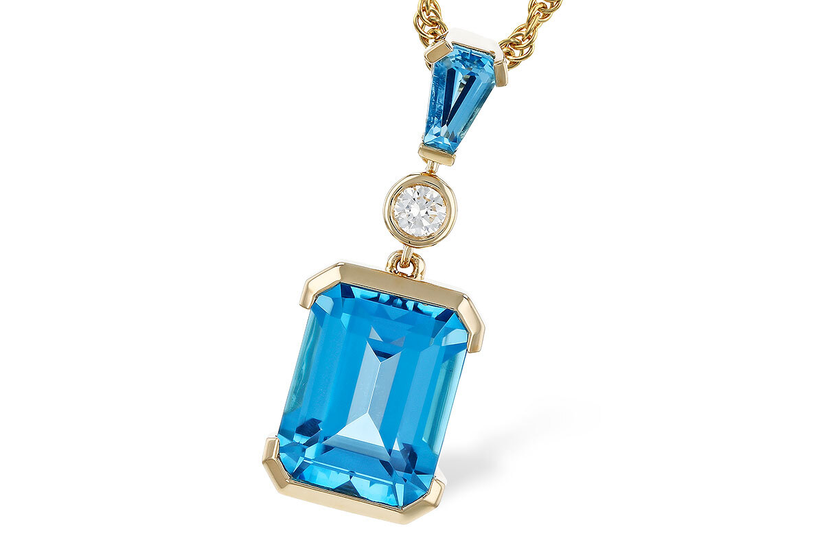 14K Yellow Gold 3.05ctw Emerald cut Blue Topaz and Baguette, .05ct Round Diamond accent  