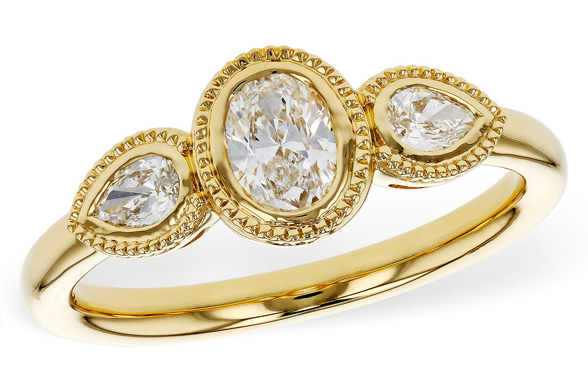 14K Yellow Gold Diamond Ring, .60ctw Oval Diamond with two Pear Shaped Diamond accents, Bezel set with milgrain edging 