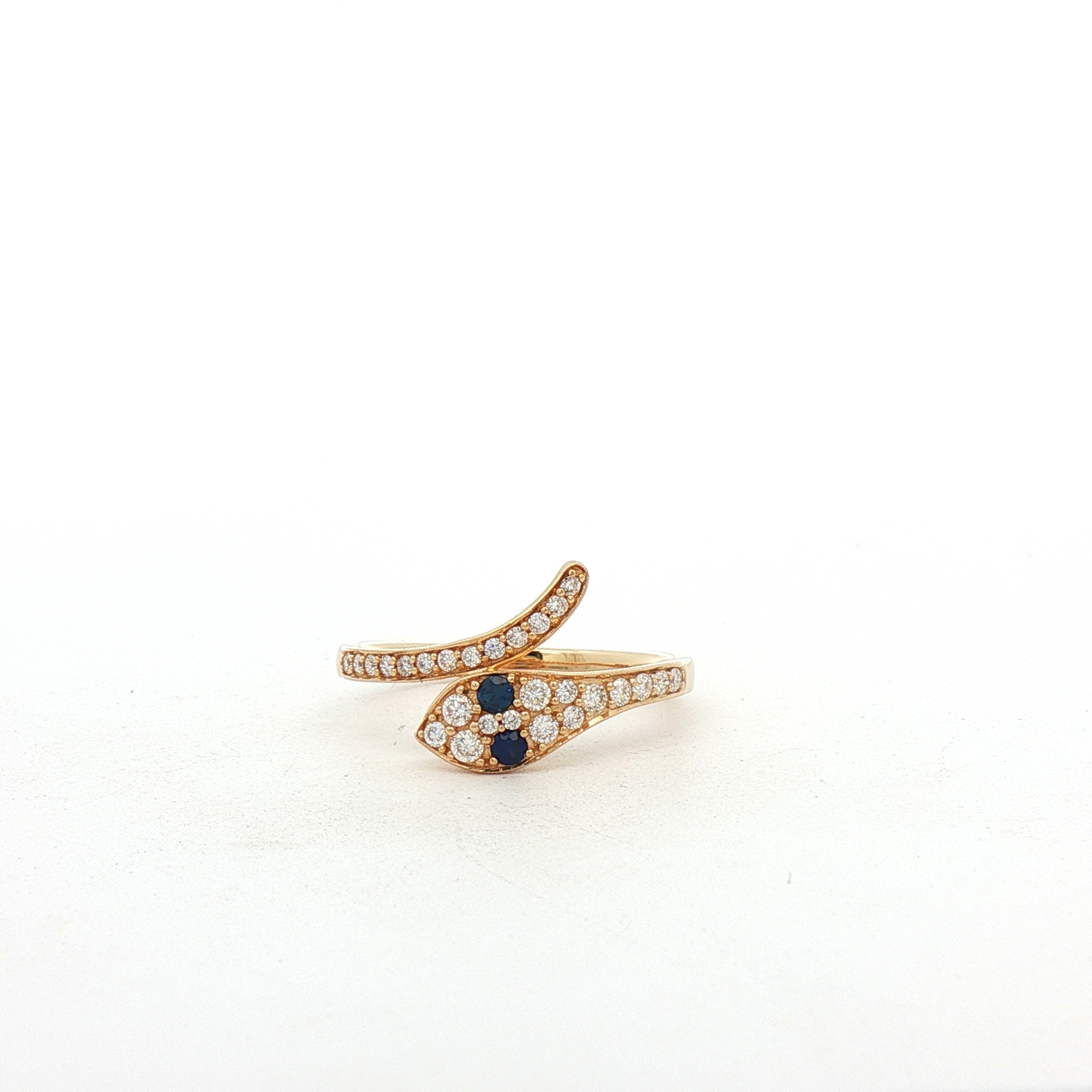 14K Yellow Gold Ring in a Snake Design with .08ctw Sapphire eyes and .25ctw Diamonds around the body