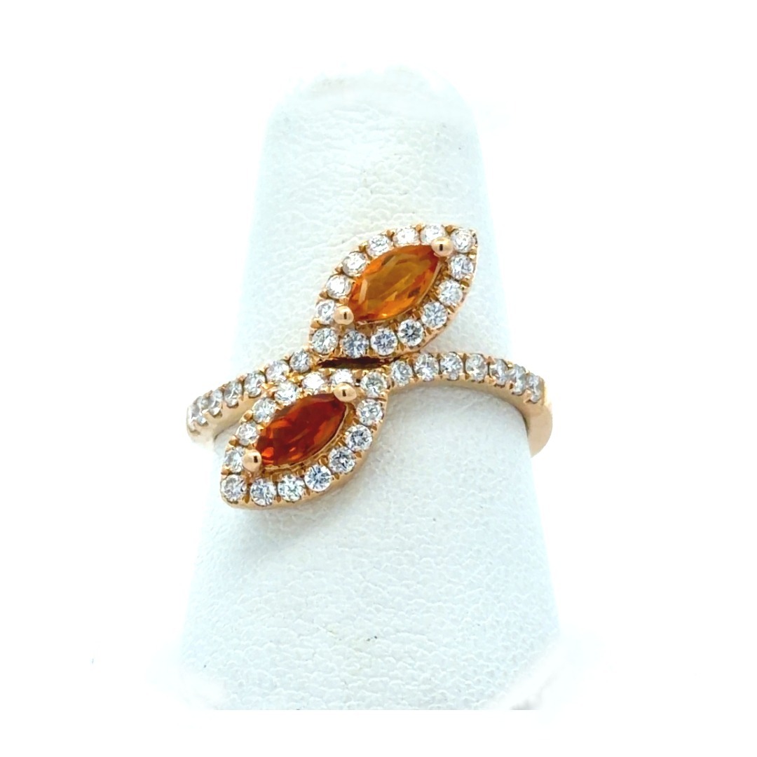 Citrine Diamond Ring, 14k yellow Gold ring with two 6x3mm Marquise Citrines set in a bypass design with .57ctw Diamond Halo and down sides of the ring  