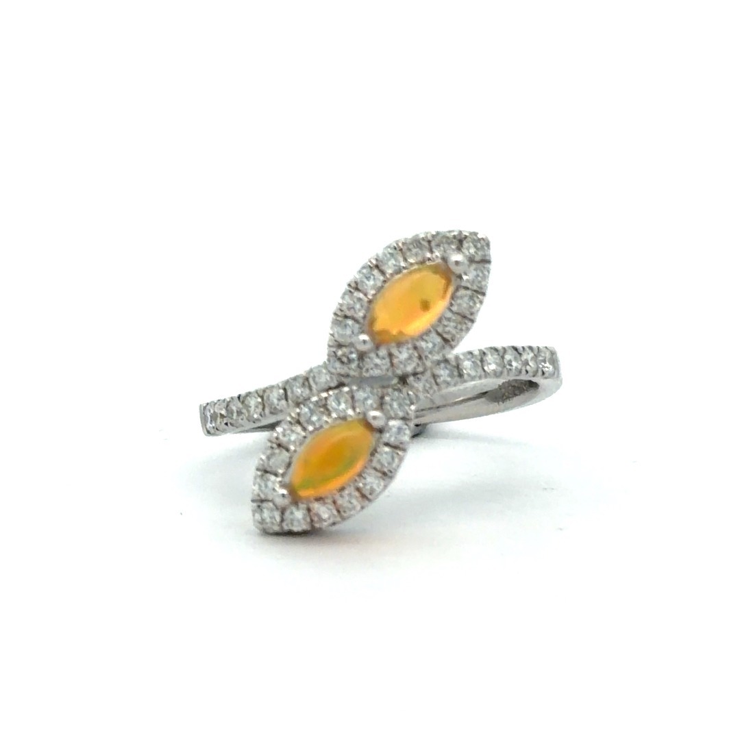 Opal Diamond ring, two 6x3mm Marquise Opals set Bypass style with .57ctw Diamond halos and down sides of the ring 