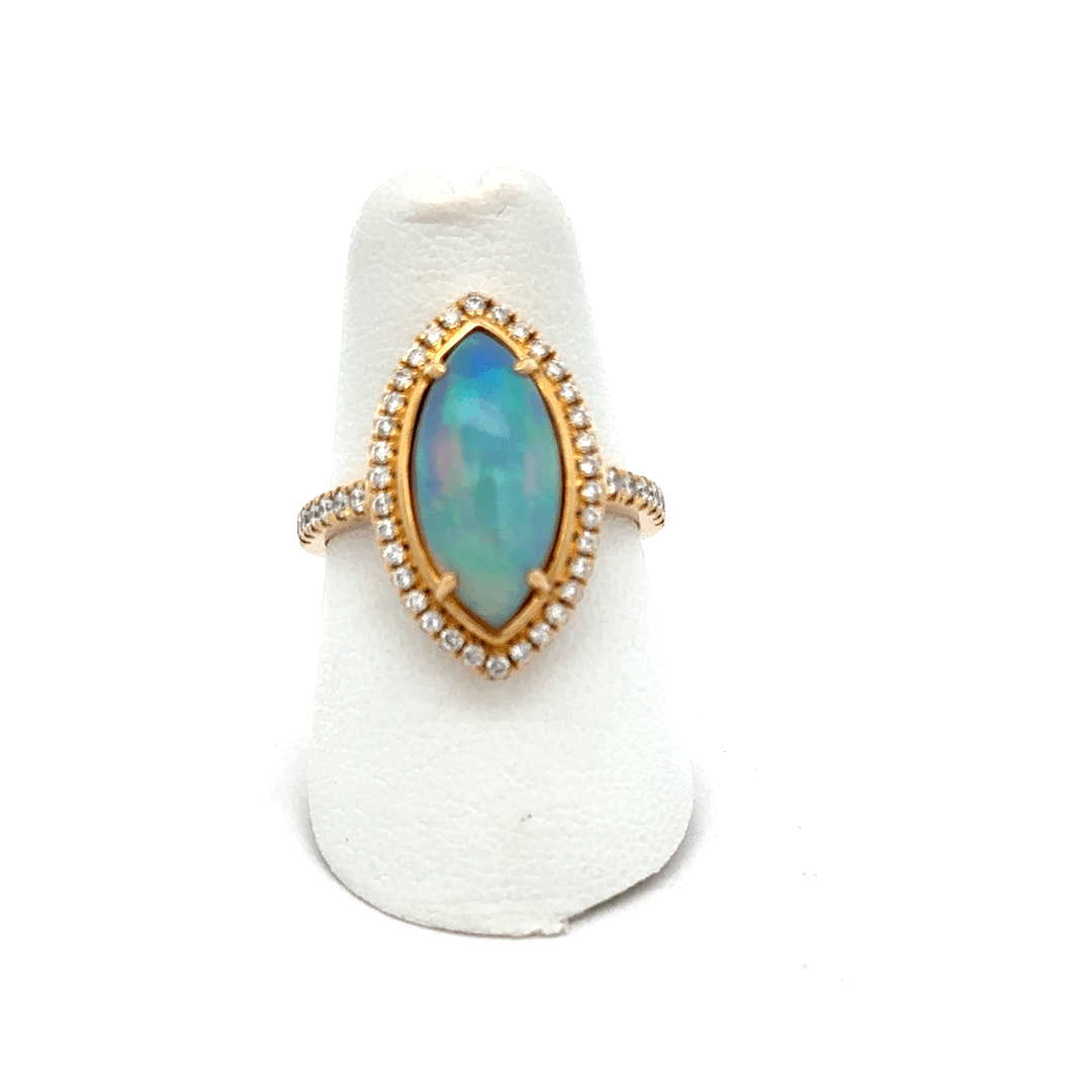 Opal Ring, 3.23ct Marquise Opal Set in 18K Yellow Gold with .43ctw Diamond Halo and Diamond accents going down sides of ring 