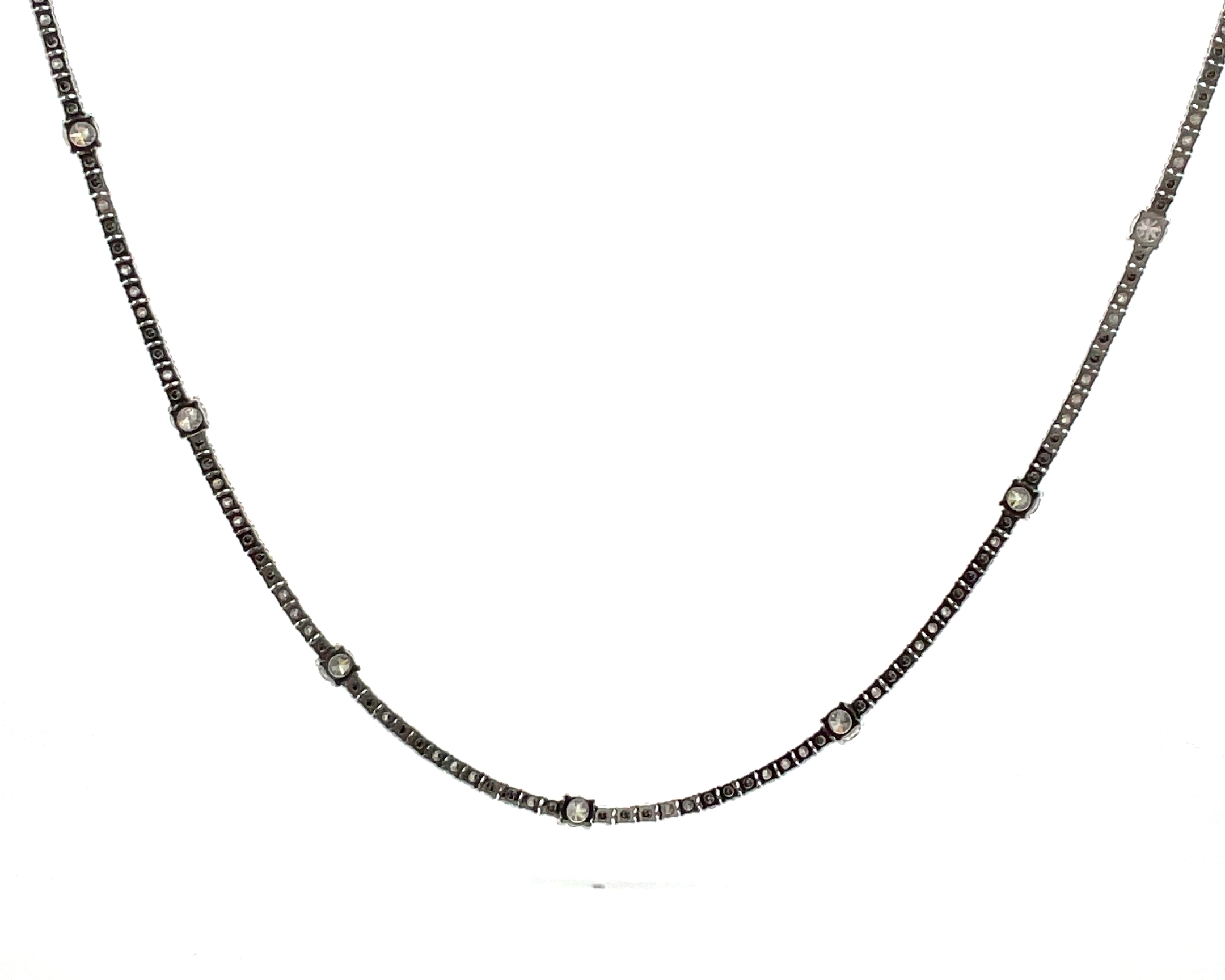 18K WG necklace 2.25ct dia, 3.65ct blk dia, 1.80ct center dia 16