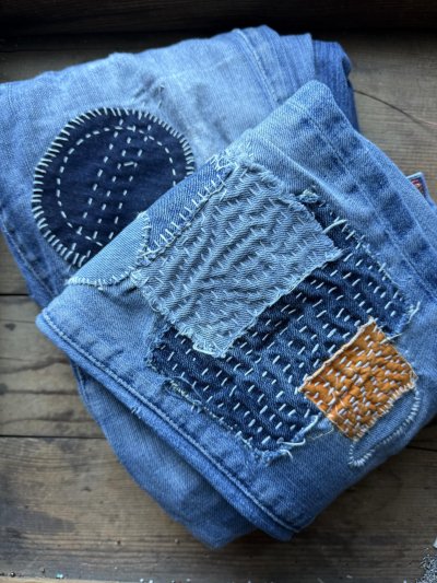 visible mending on jeans