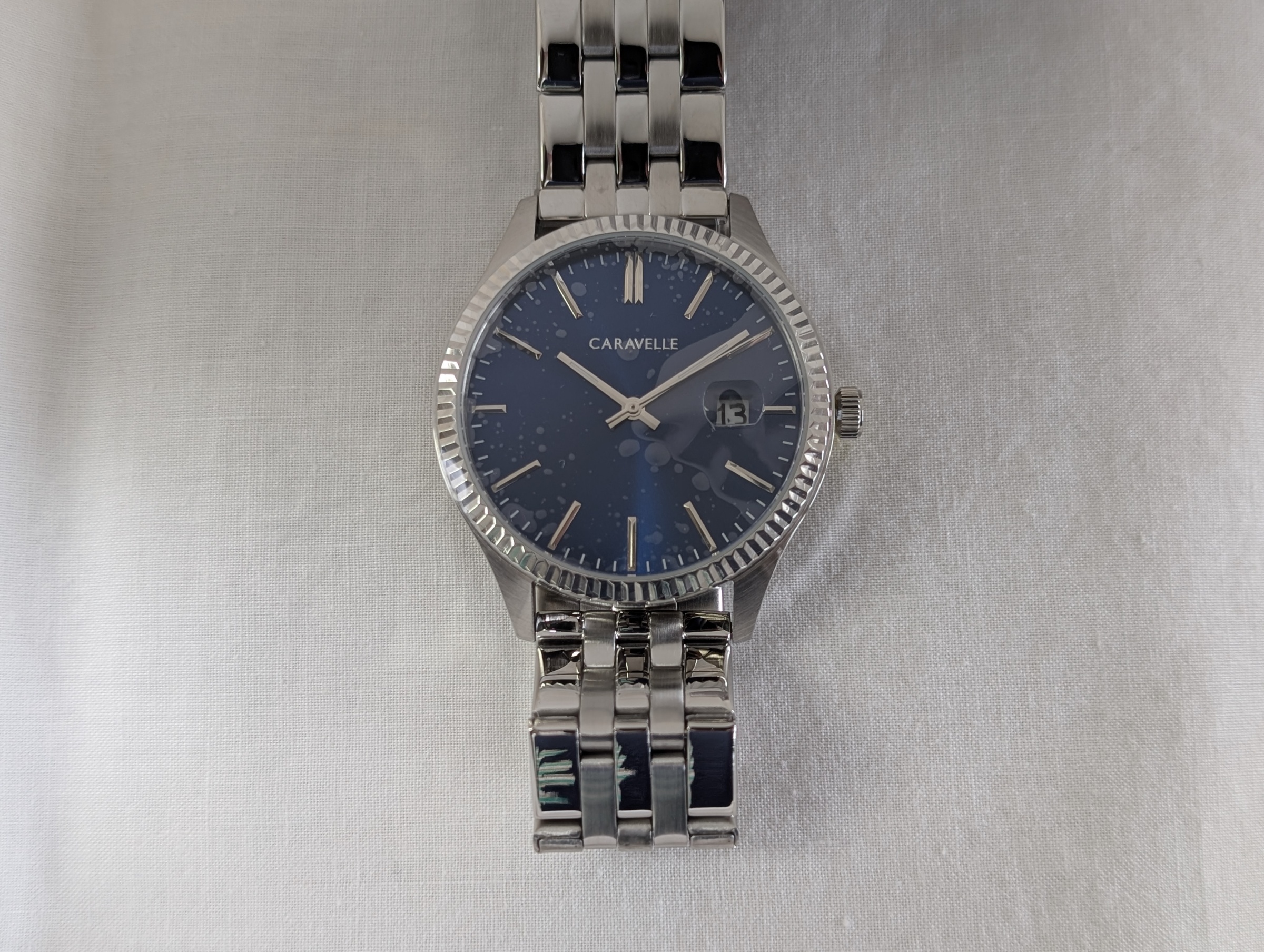 Mens white Caravelle watch with blue dial and fluted bezel 26-11--1283 FELOE