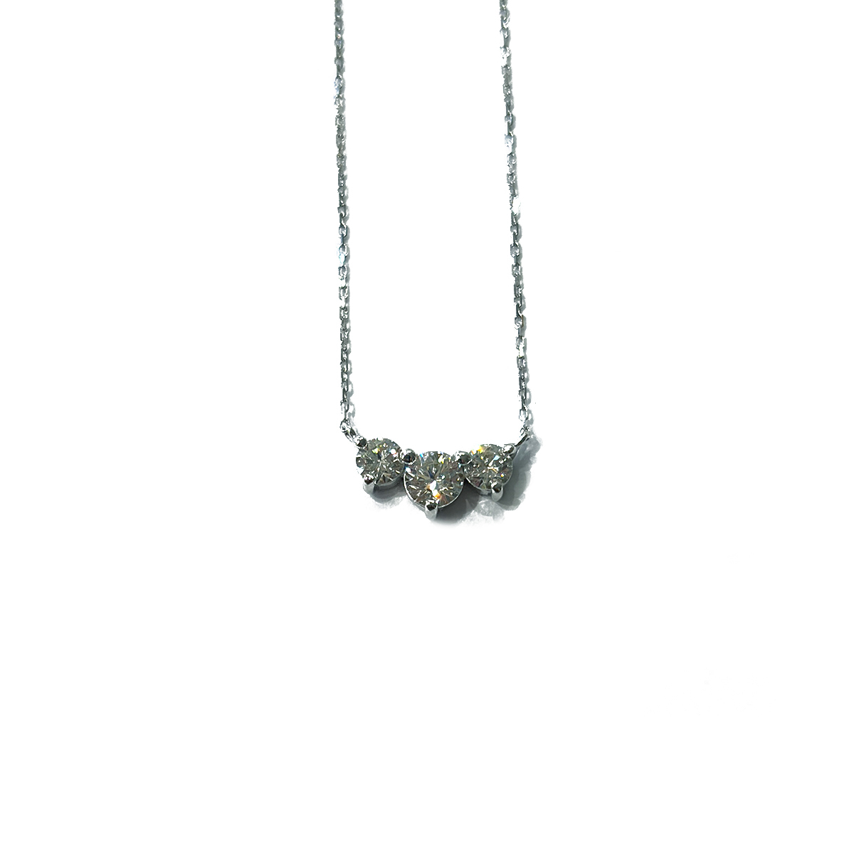 0.47cttw Three-Stone Diamond Graduated Pendant Prong Set in 18K White Gold on a Dedicated 18K White Gold Adjustable Chain