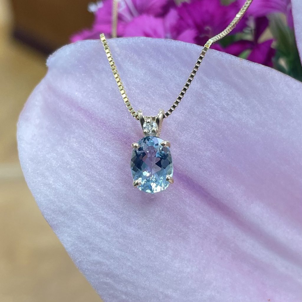 1.19ct oval aquamarine set with .02ct diamond in 14k yellow gold pendant 18 14k gold box chain