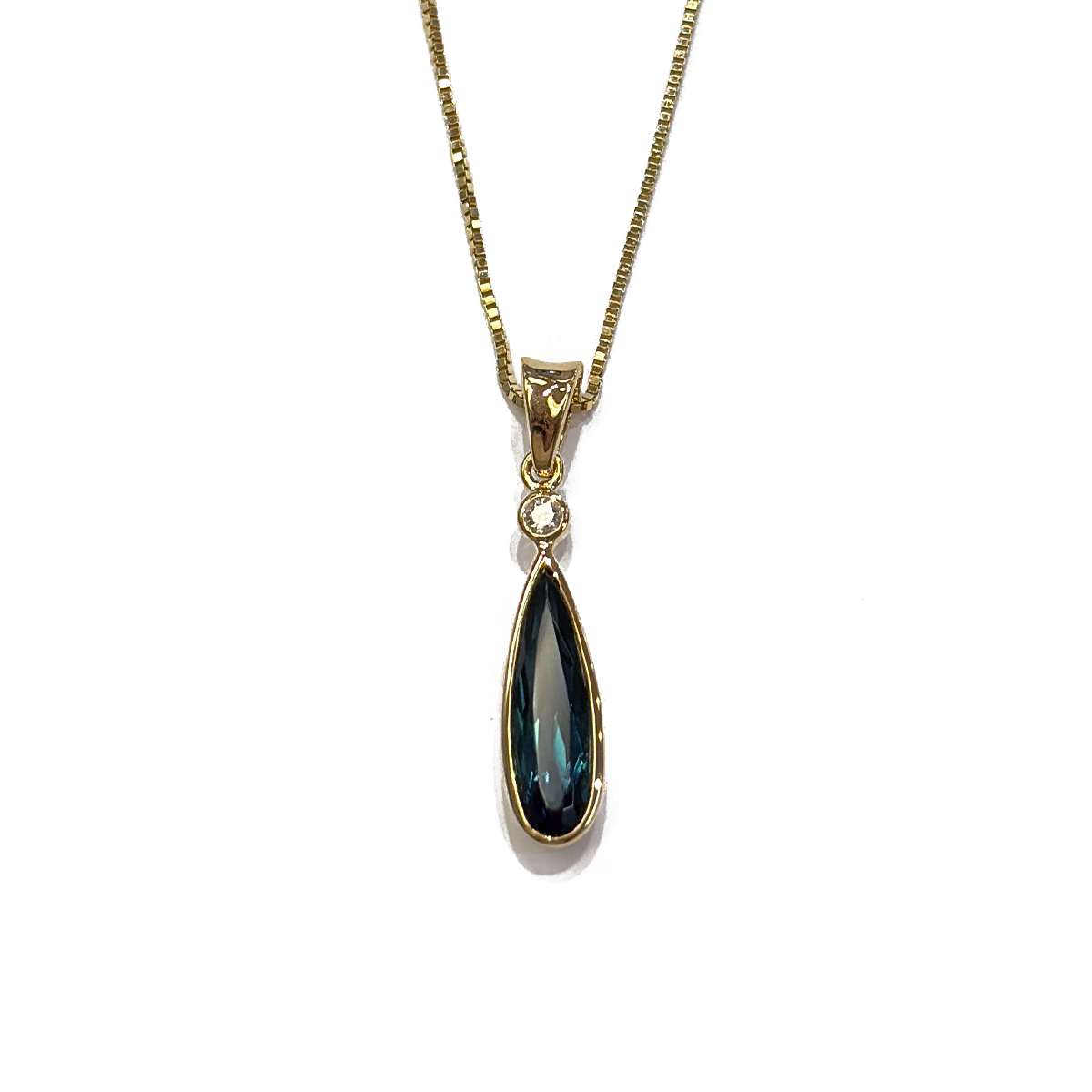 1.26ct Elongated Pear Cut Indicolite Tourmaline Pendant with a 0.03ct Diamond Bezel Set in 18K Yellow Gold on an 18 14K Yellow Gold Box Chain