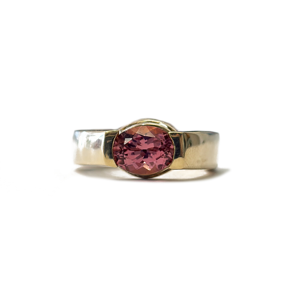 1.37ct Maine Pink Tourmaline Tension Set Ring with 0.20cttw Diamond Hidden Halo Accents Set in a 14K Yellow Gold European Shank Setting