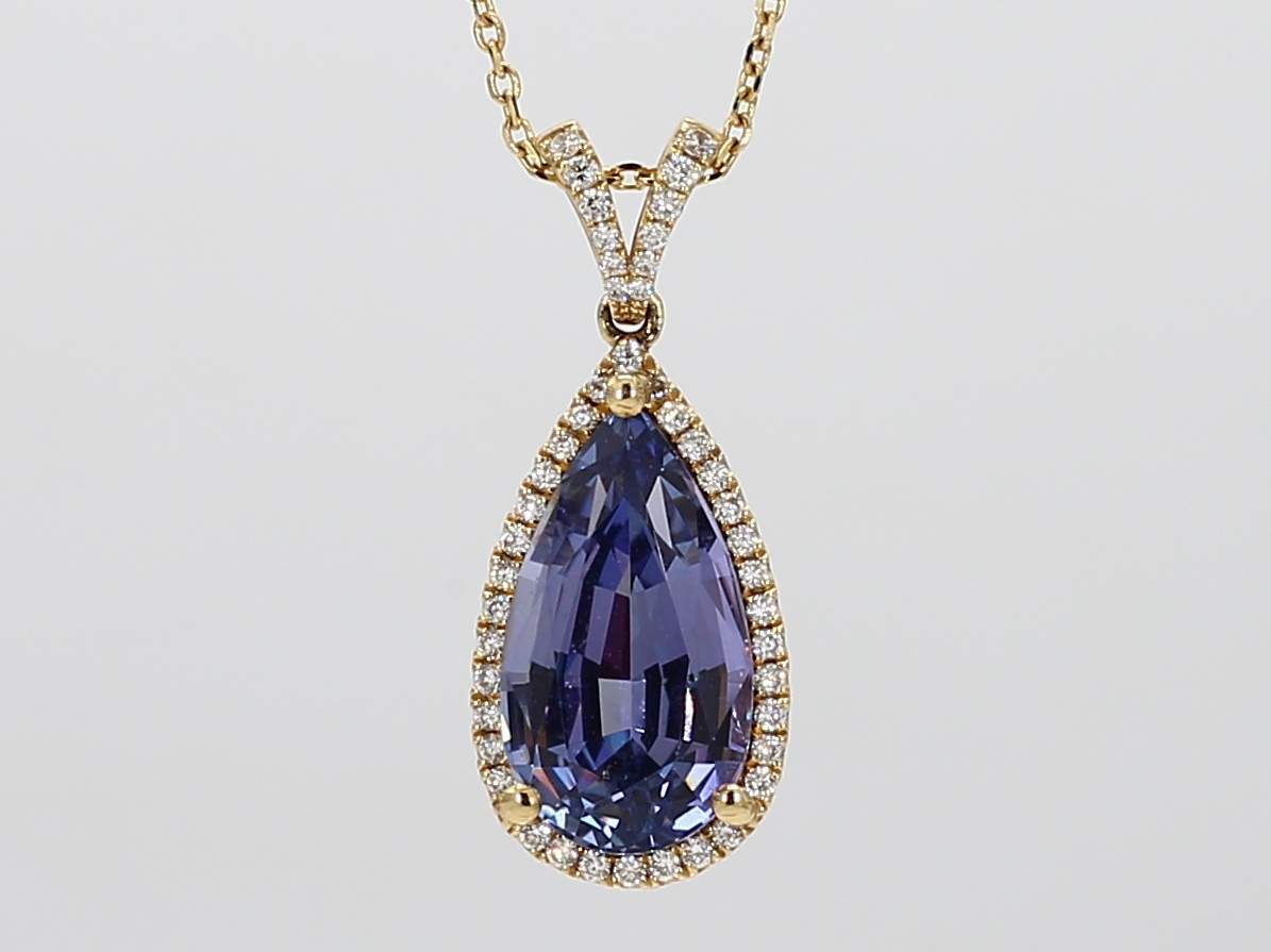 5.34ct Pear Cut Tanzanite Pendant with 0.23cttw Diamond Halo Accent Prong Set in 14K Yellow Gold on an 18 14K Yellow Gold Box Chain