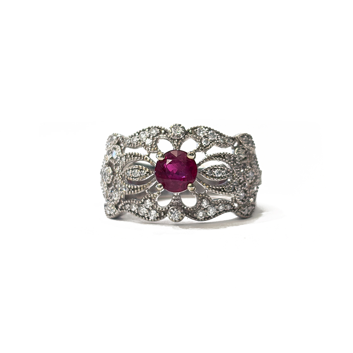 Estate Filigree Band Featuring a 0.68ct Round Ruby Accented by 0.50cttw Diamonds Prong Set in 14K White Gold