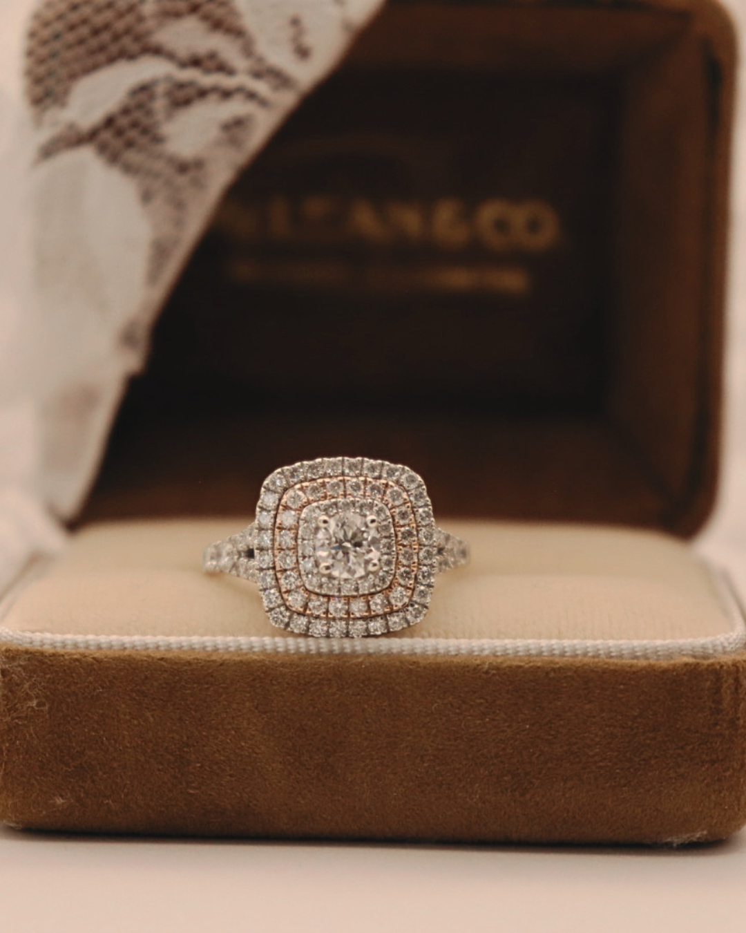 Pre-loved 14k White Gold 1.50cttw Diamond Halo Engagement Ring w/ Rose Gold Accents