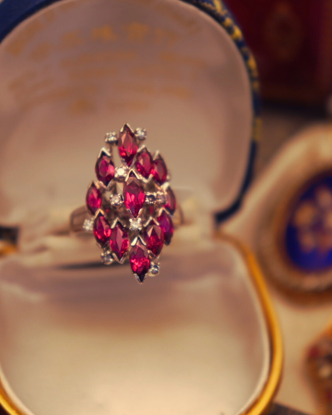 Pre-loved 18k White Gold Custom Natural Thailand Rubies Marquise Cut with .05cttw Pave Diamond Accent