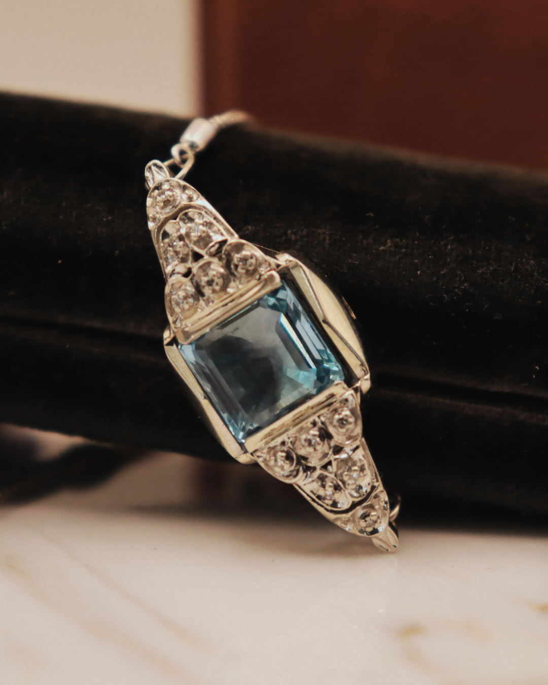 Pre-loved Modified 14k White Gold Bulova Watch Case Bracelet with Diamond Accents and Blue Topaz Center Stone