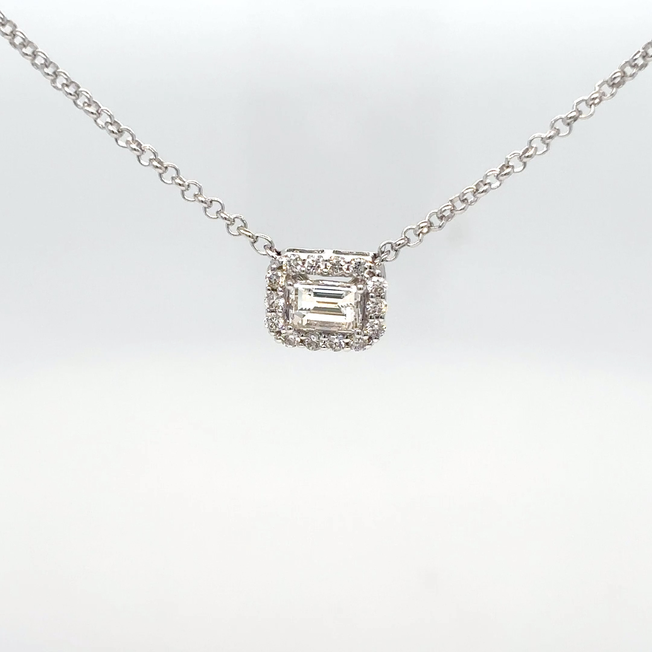 14KW 18 0.40CTW EMERALD CUT-ROUND DIAMOND HALO PENDANT VS2/G 2.7G