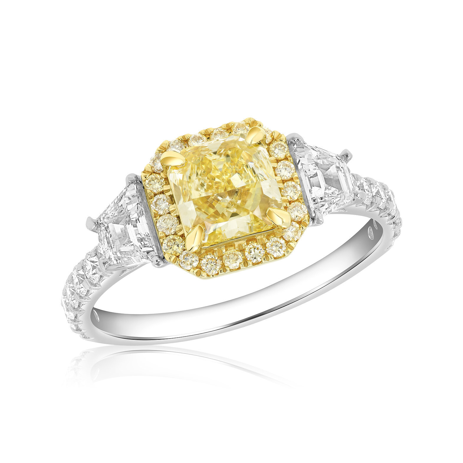 14K White & Yellow Engagement Ring Ft. 1.06ct Light Yellow Radiant. Accented with 20 Fancy Yellow Diamonds (0.16ct in the Halo) & 14 F-G White Melee on the Shank (0.35ct). Side Stones off the Halo are 2 Traps (0.63ct). Size 7