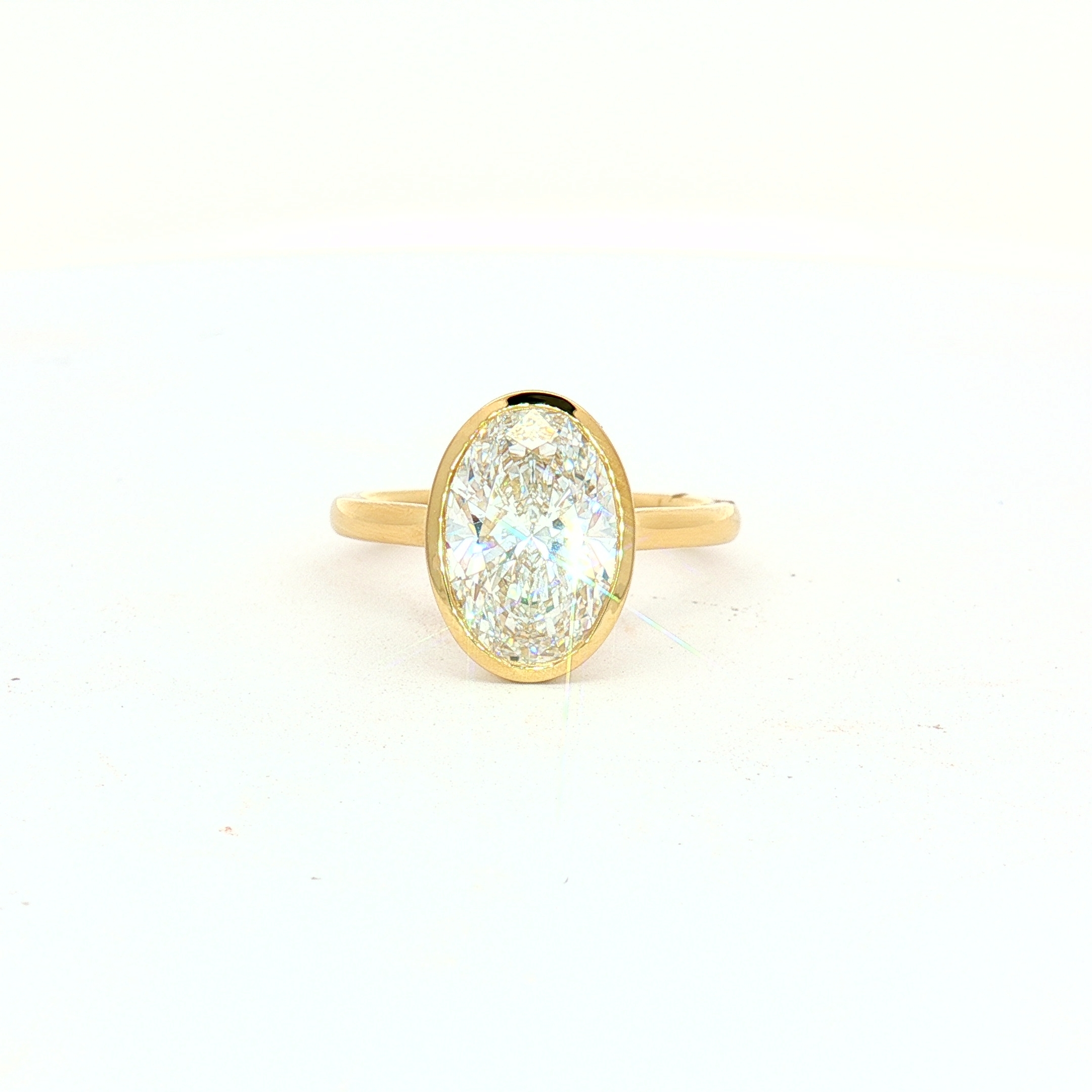 14K Yellow Gold Bezel Solitaire Ring With 3.00ct LGD Oval Cut, Size 7.5