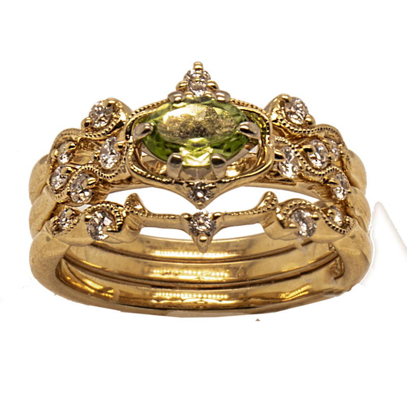 14K Y .56ct oval faceted Peridot .30ctw round faceted HI, I1 diamonds 3 band ring by Ostbye