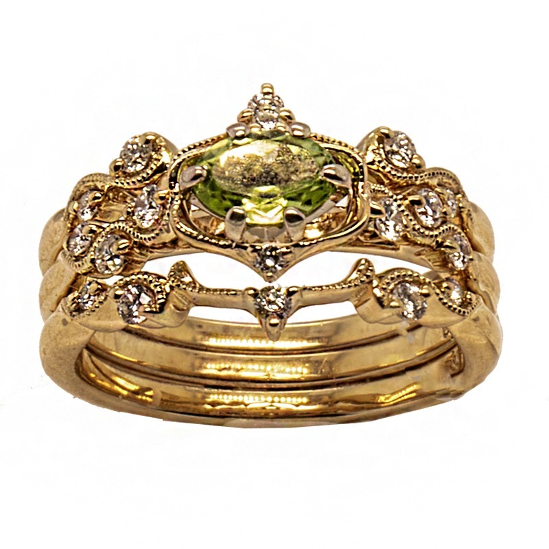 14K Y .56ct oval faceted Peridot .30ctw round faceted HI, I1 diamonds 3 band ring by Ostbye