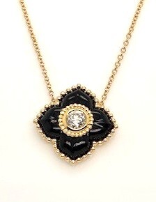 18 14K Y .20ctw faceted round natural diamond and Onyx petal pendant with chain