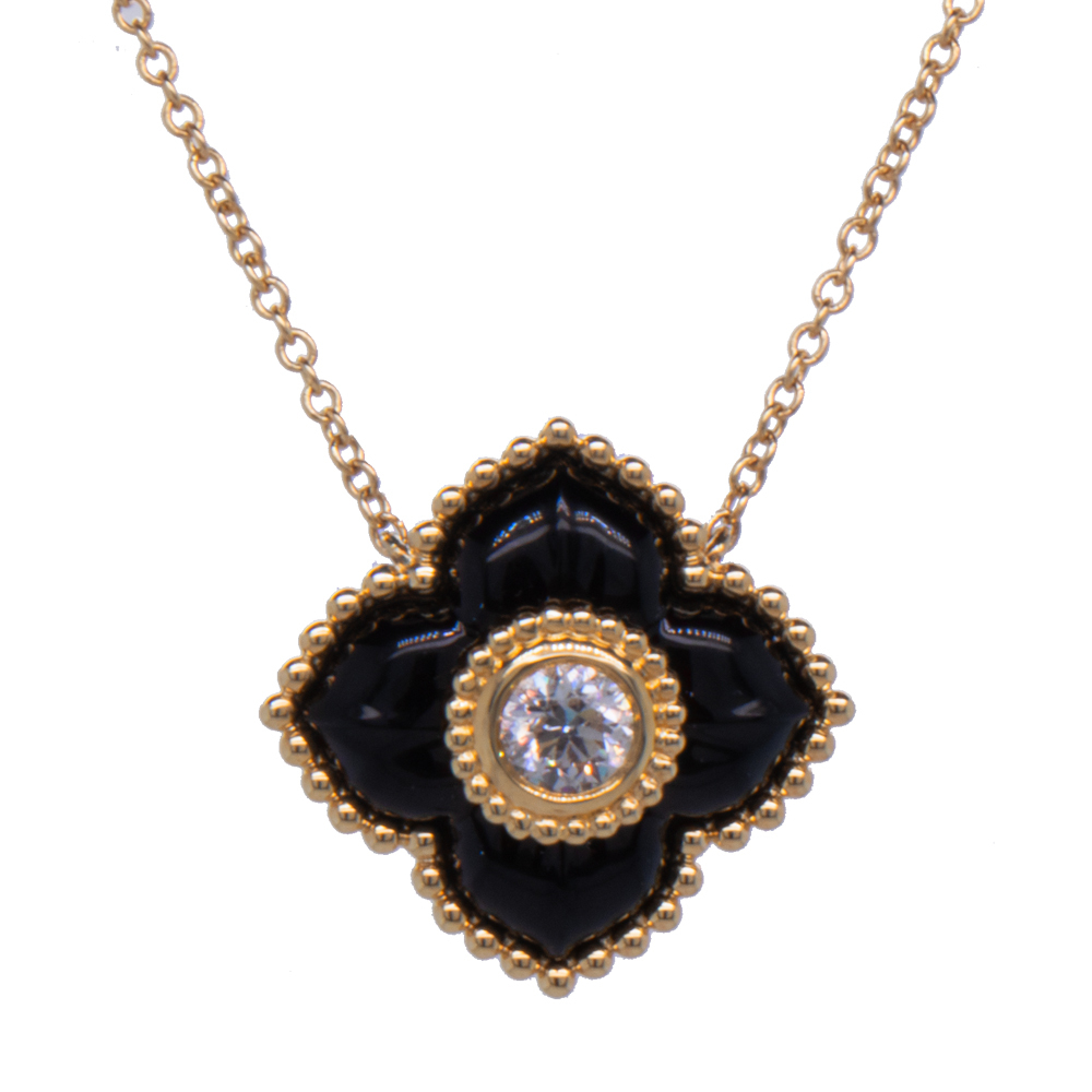 18 14K Y .20ctw faceted round natural diamond and Onyx petal pendant with chain