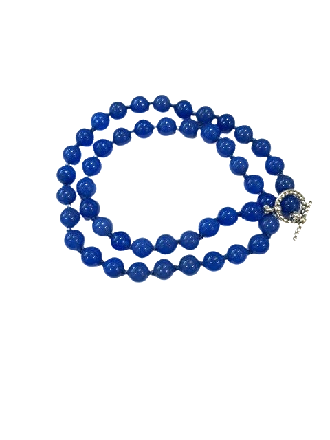 19 8.5mm dyed Blue Agate beads hand knotted silk with Sterling Silver toggle clasp. 