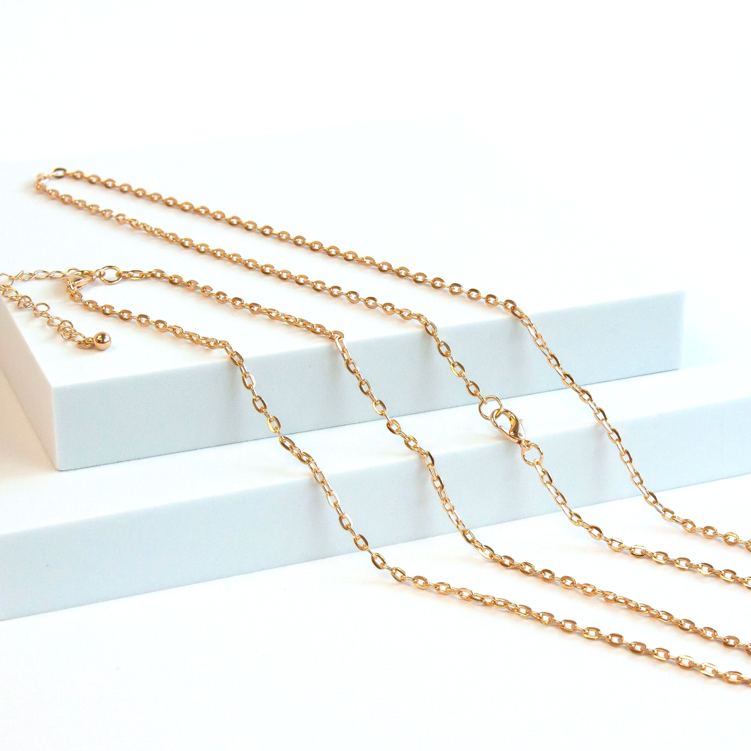 Alchemia 30 gold tone metal flat oval chain with lobster clasp made by Charles Albert 