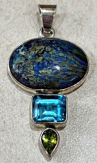 Sterling Silver Azurite, faceted emerald cut Blue Topaz and faceted pear shape Peridot pendant by Charles Albert