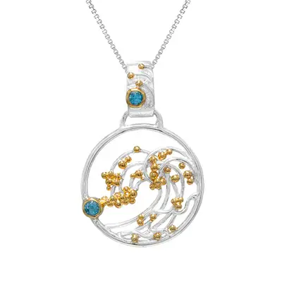 Sterling Silver and 22K Gold Vermeil with Baby Blue Topaz rolling waves pendant/necklace made by Michou