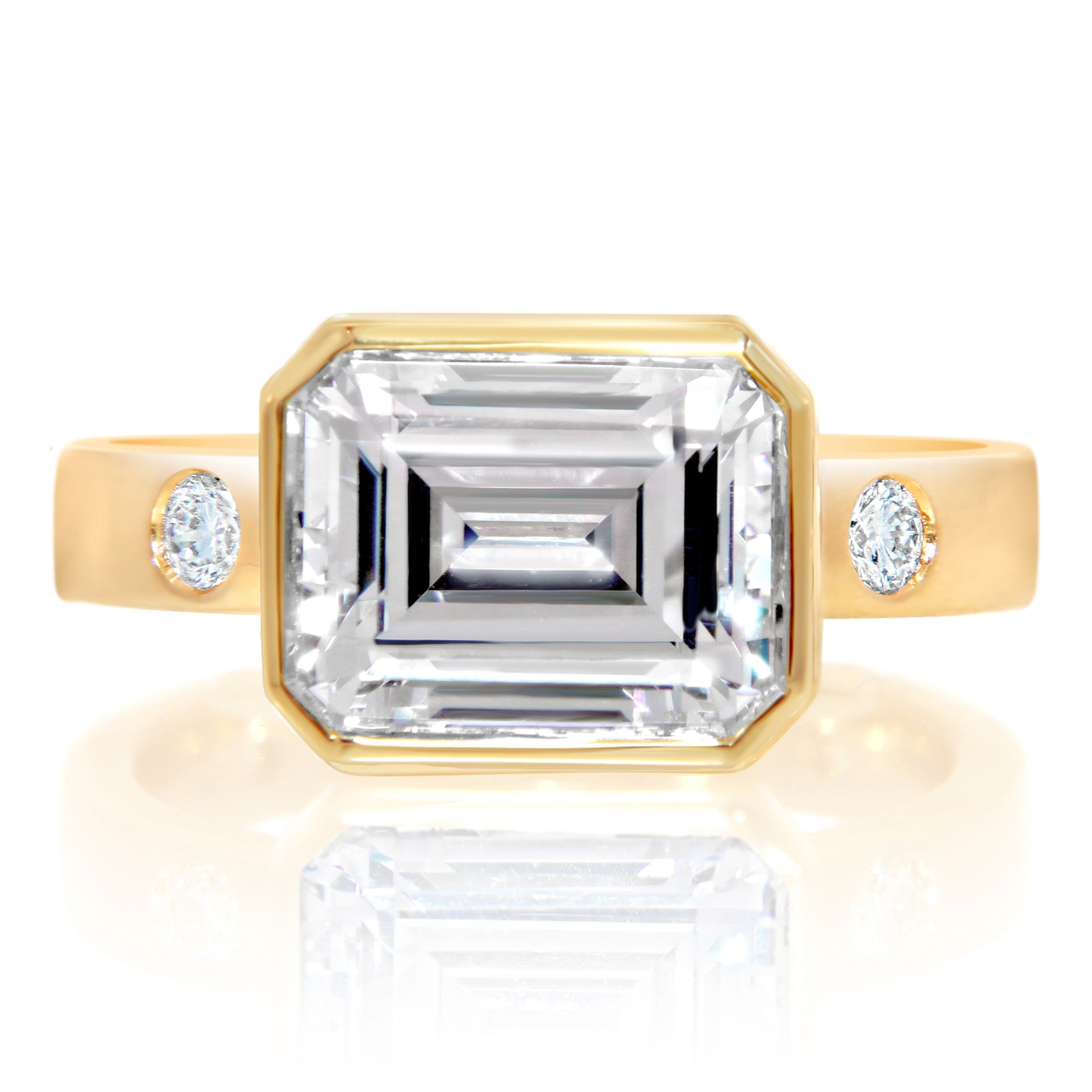 Yellow Gold Emerald Cut Bezel and Burnished Round Station Engagement Ring CZD 0.33CT