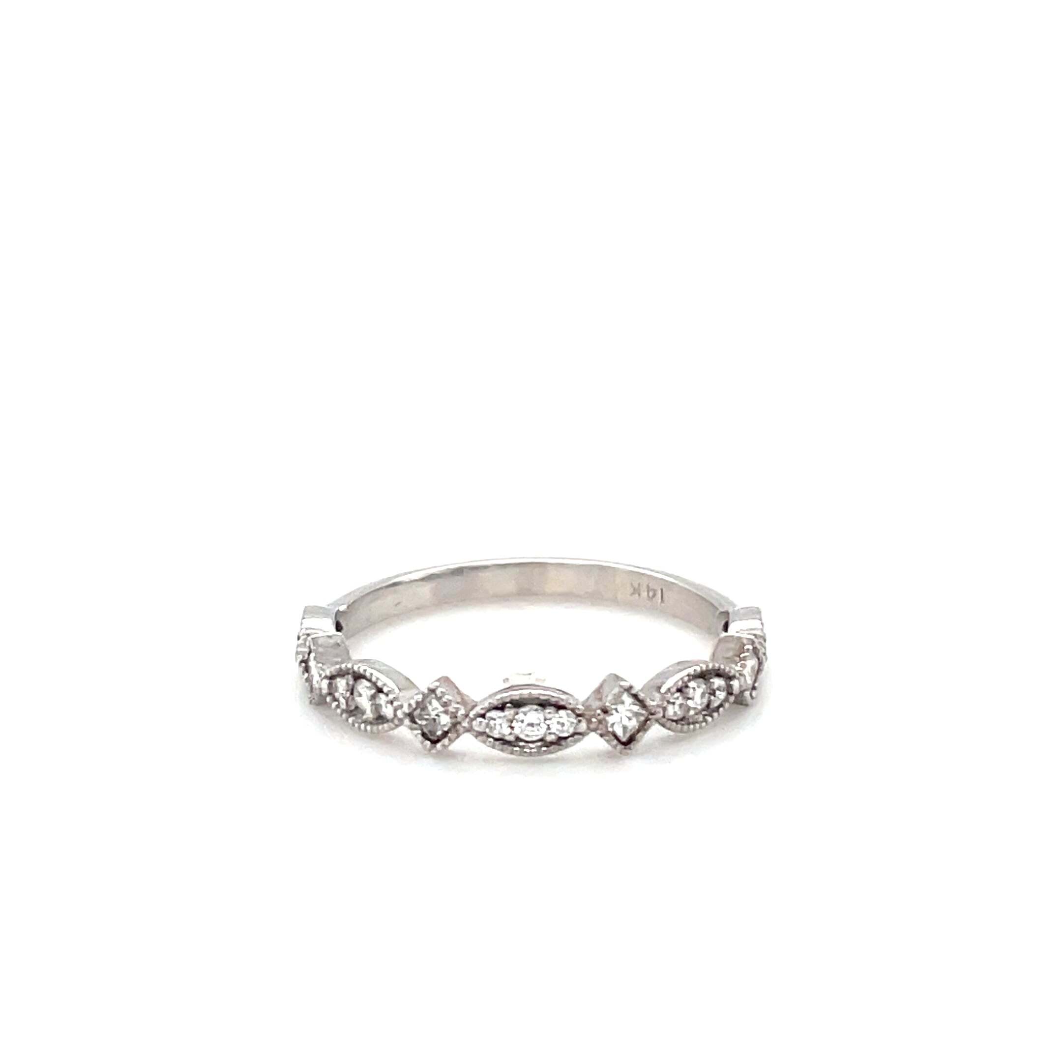 14k white gold vintage style wedding band with princess cut and brilliant round diamonds. .32ct total weight SI2/G-H