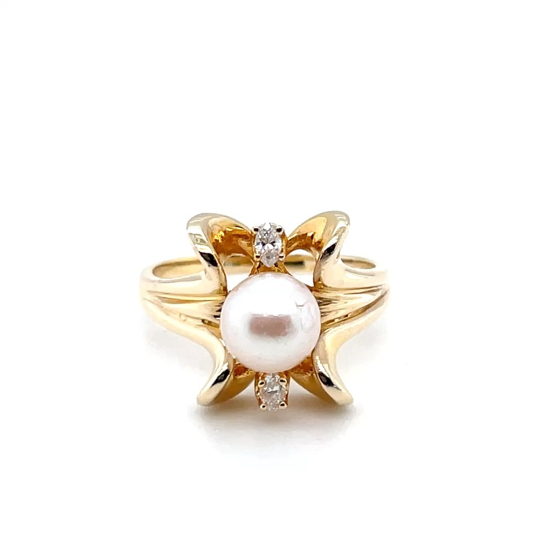 14k yellow gold ring with 8mm pearl and 2 marquise diamonds at .14ct total weight