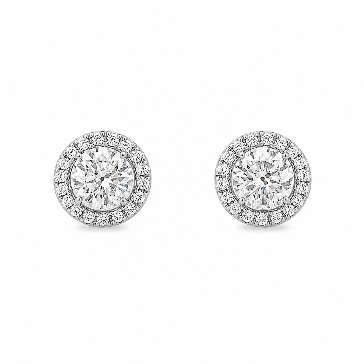 Diamond Studs (0.80tcw) set in 14kt White Gold Three Prong Earring (0.14ct)