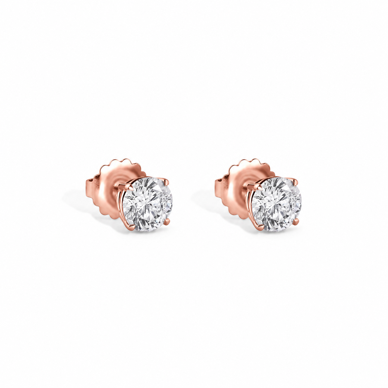14k Rose Gold Ladies Stud Earrings With Two Round Brilliant Diamonds Totaling 1.28ct Of J Color, I1 Clarity