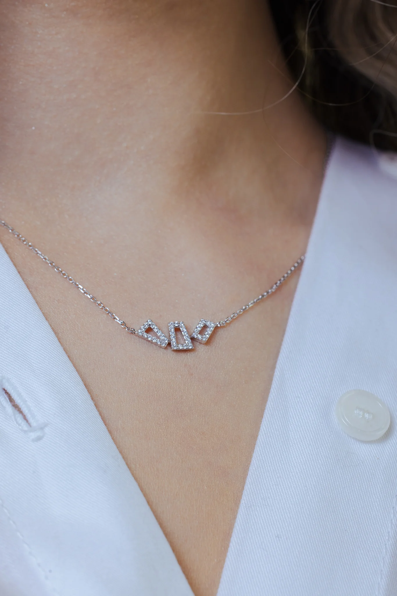 2.52 Grams, 14k White Gold 3 Trapezoid Necklace With 41 Diamonds Totaling 0.16ct Of E-F Color, VS1 Clarity