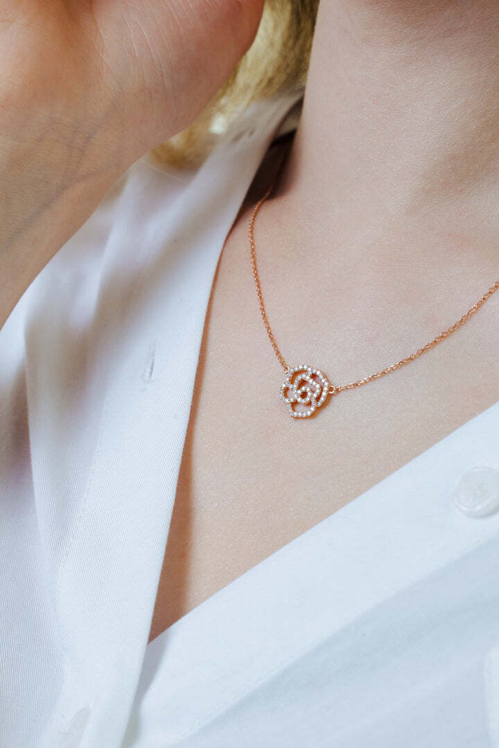 2.97 Grams, 14k Rose Gold Rose Necklace With 54 Round Brilliant Diamonds Totaling 0.35ct Of E-F Color, VS1 Clarity