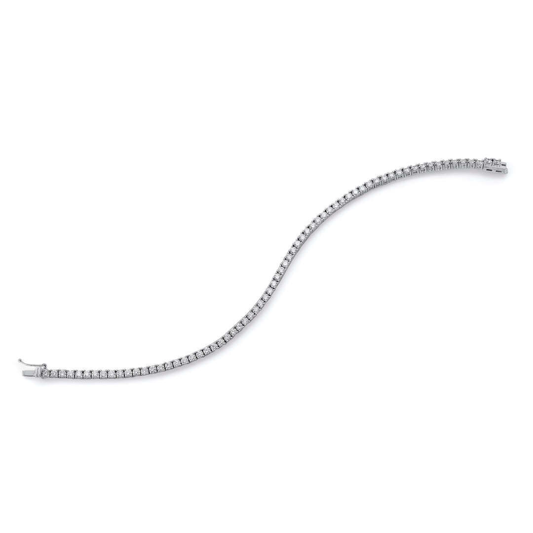 6.76 Grams, 14k White Gold Hand Set Diamond Tennis Bracelet Containing 67 Round Brilliant Diamonds Totaling 2.98ct Of F Color, VS Clarity