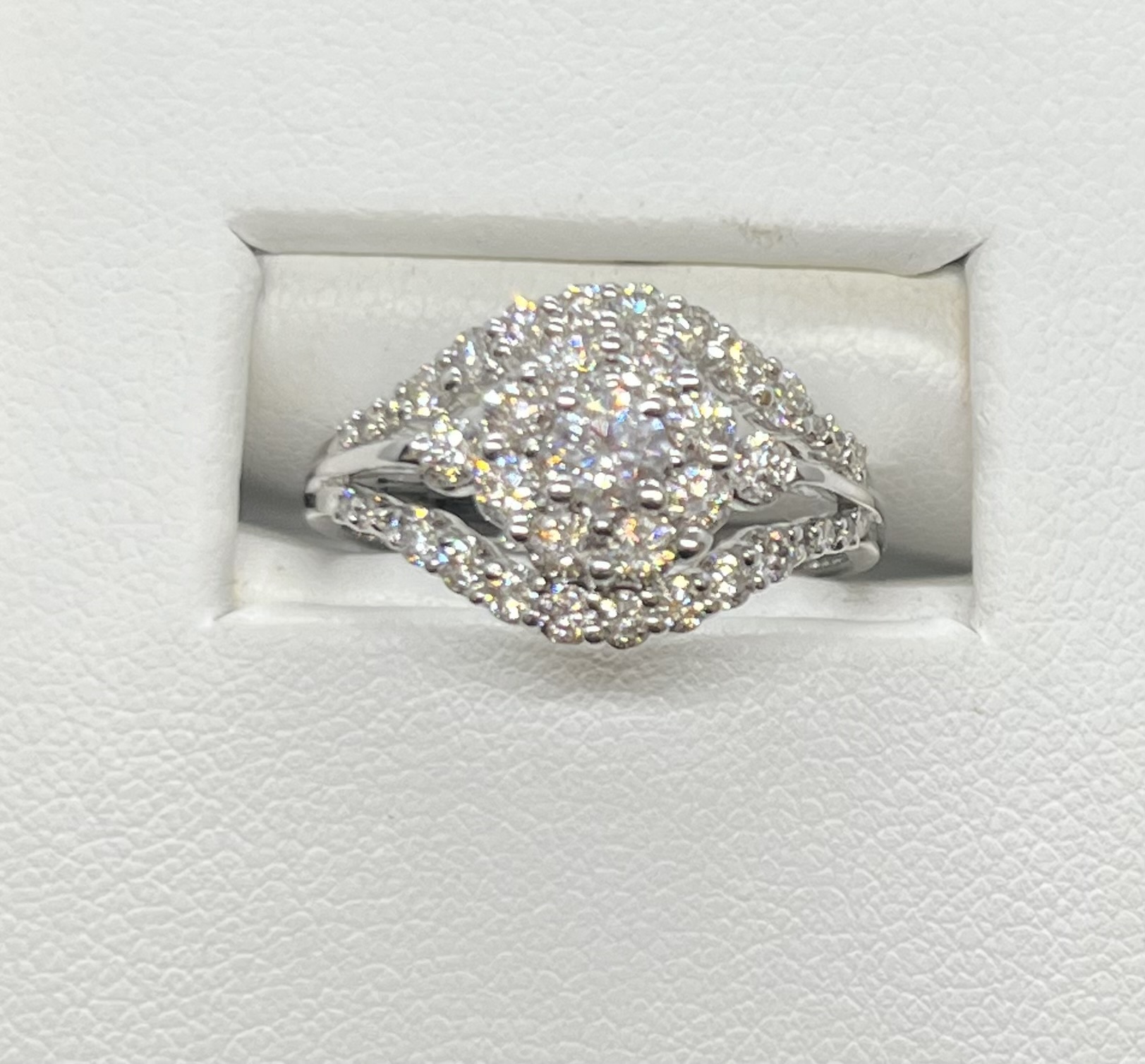 1.00ct Diamond ring, flower shaped centre with 1 row on either side, (.185 Canadian I-1clarity G-I clarity +.82 rounds) 14K White gold CERT#1762 tracking #CAD132375