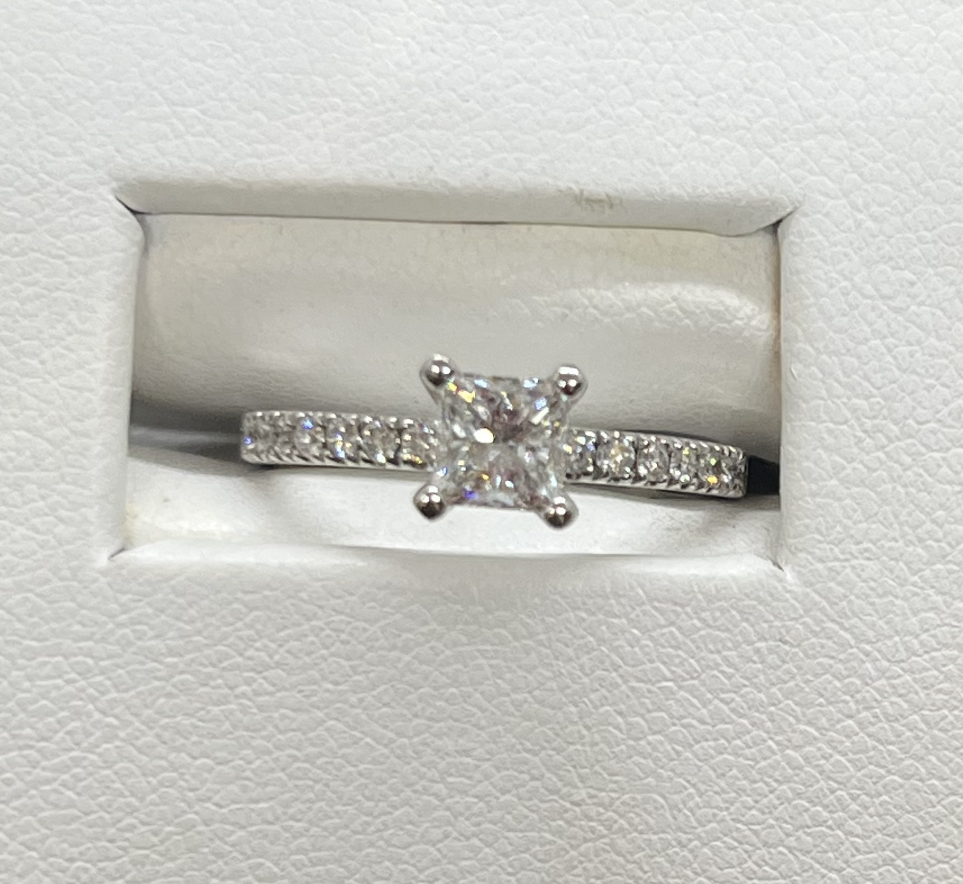 1.08ct diamond ring, Princess cut centre .38ct with round sides .70 14K White gold