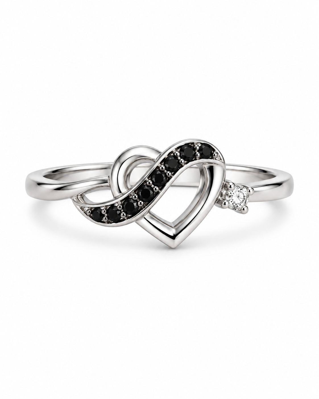 Lady's diamond heart shaped ring with .03 Treated black diamonds & .06 White diamonds 10K White gold #DD2387