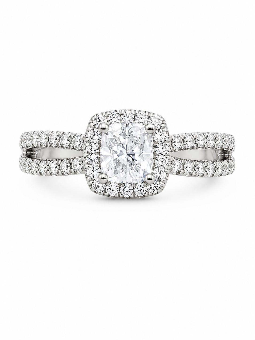 I am Canadian diamond ring with .51ct I1-F Cushion cut in centre with 52 round side diamonds on split shoulders .35ctw I-1 G-I 14K White gold, CERT#1409 tracking #CMCO-153673