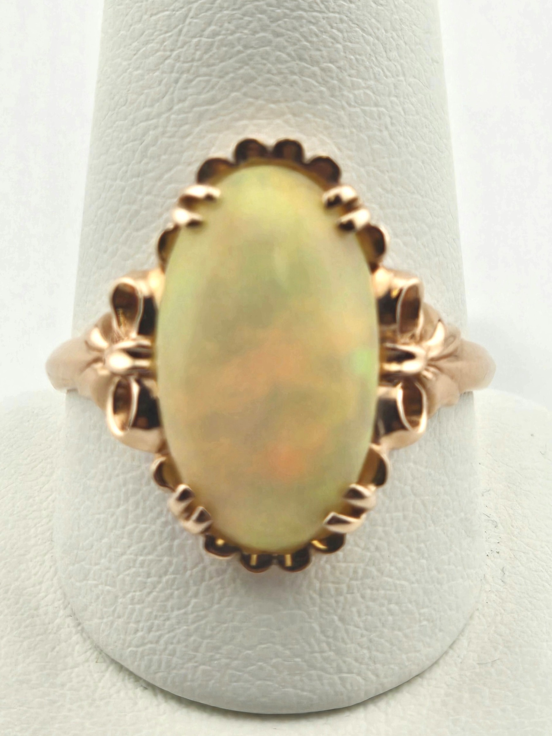 14KR OPAL ~6CT 18.3MM X 10.6MM RING SIZE 10.75
