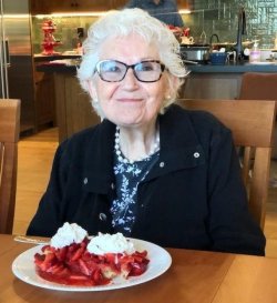 mom with strawberry waffles