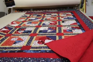 texas red white and blue quilt with a red minky backing.